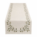 Chemin de table brodé avec motif de feuilles vertes