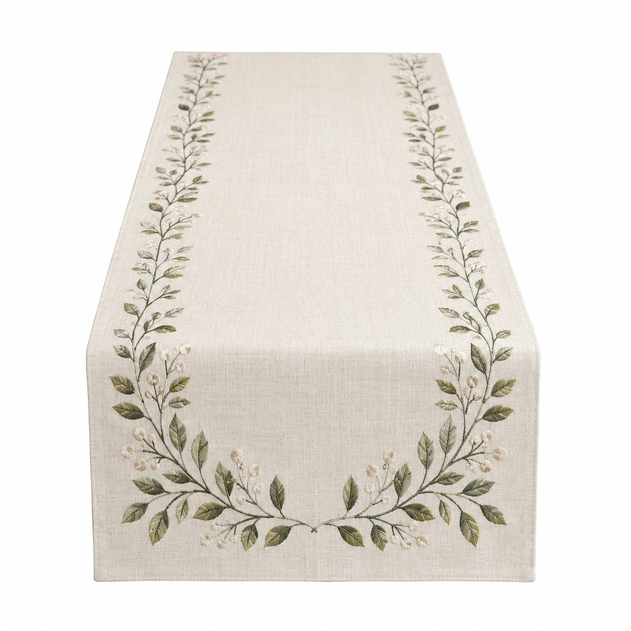 Chemin de table brodé avec motif de feuilles vertes